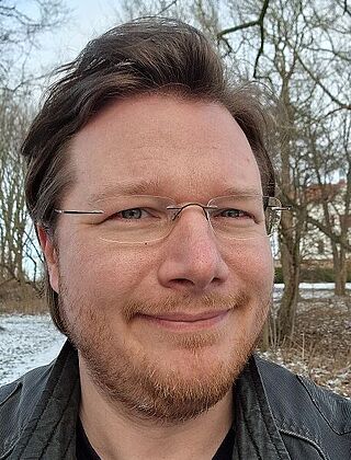 Dr. Christopher  Arlt